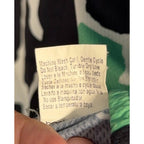 Second Half Supply Co, LLC vintage Pearl Izumi cycling jersey care tag with washing instructions in multiple languages