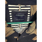 Second Half Supply Co, LLC Denim & Flower Ricky Singh shirt label showing XL size and navy fan print fabric
