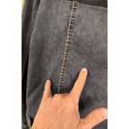 Second Half Supply Co, LLC denim jacket showing a small light mark on the faded black fabric near the seam