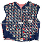 Second Half Supply Co, LLC handmade reversible denim rag quilt vest with patchwork floral lining and frayed edges.