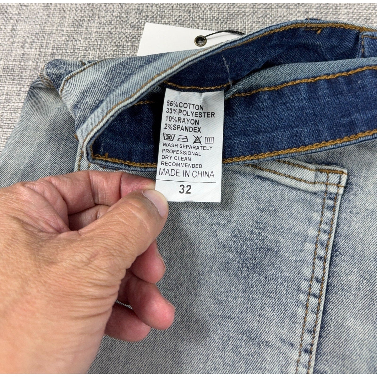 Second Half Supply Co, LLC D'Andijieshen denim shorts interior care tag showing material blend and size 32