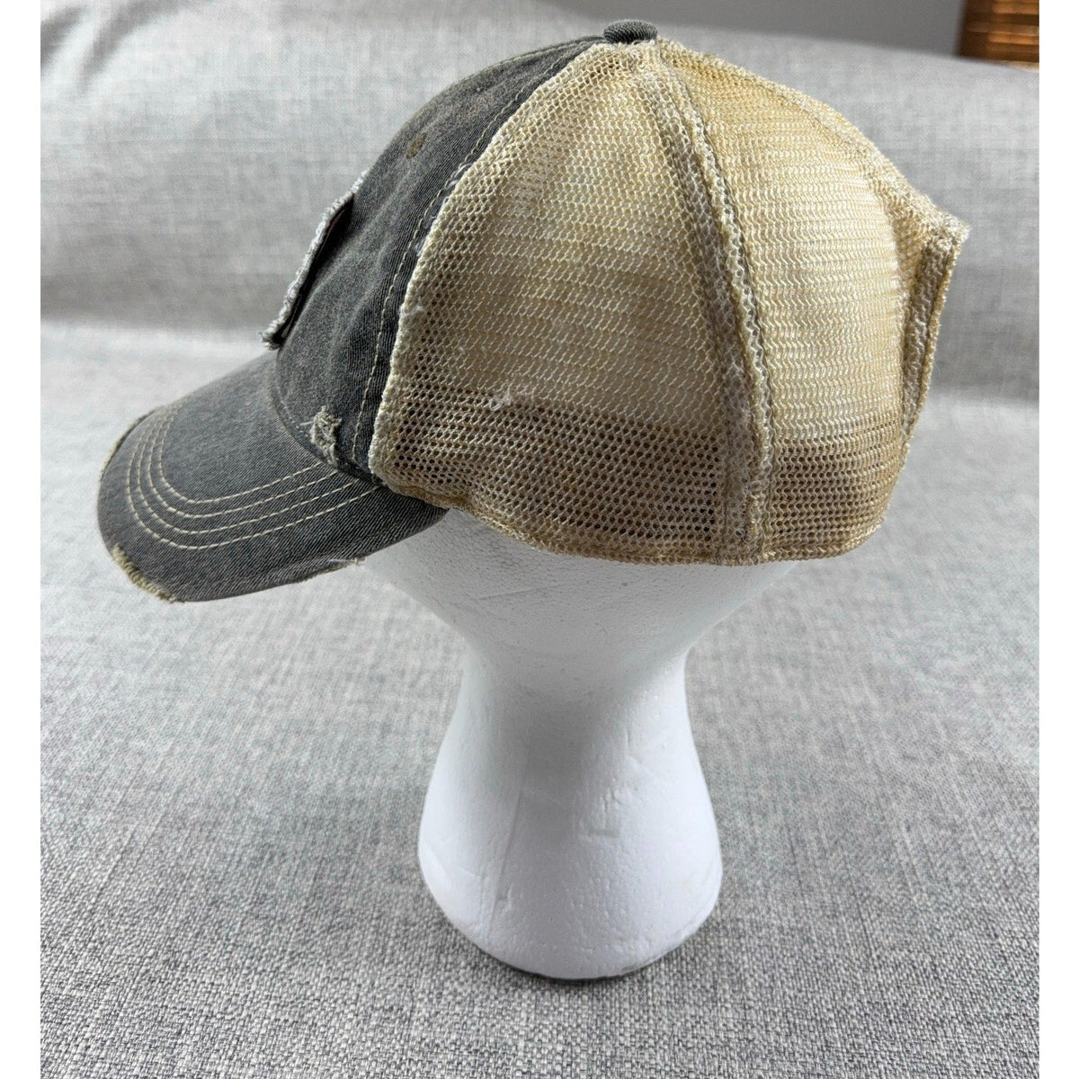 Second Half Supply Co, LLC gray and tan distressed mesh trucker hat with Jeep Girl patch on a white mannequin head