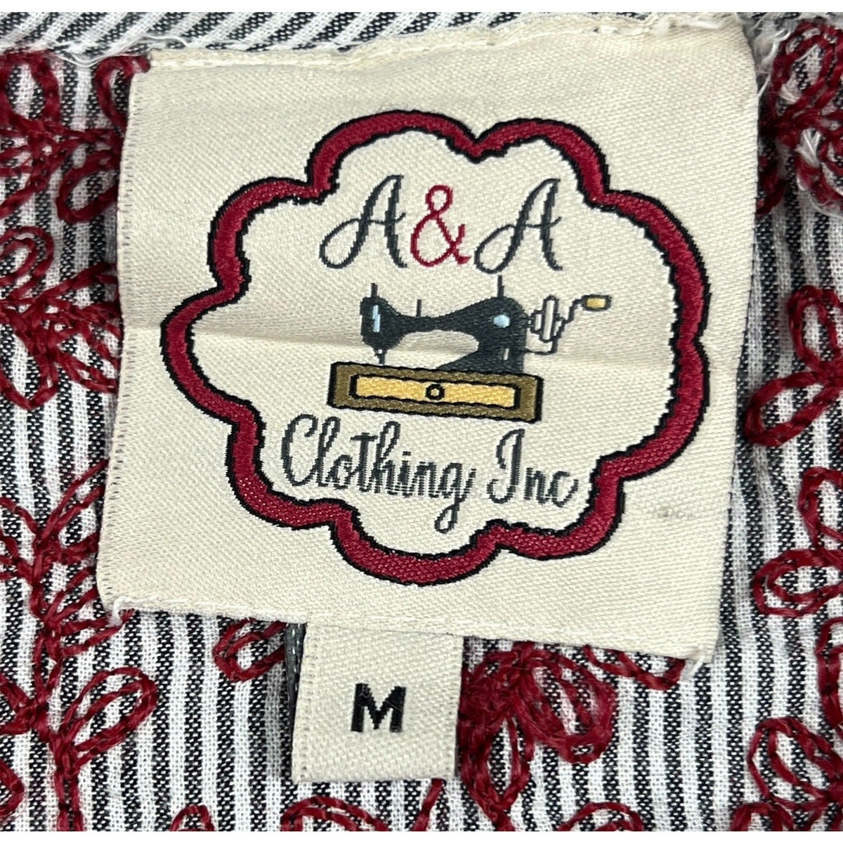 Second Half Supply Co, LLC label on A&A Clothing embroidered striped cotton tunic with burgundy folk-style detail.