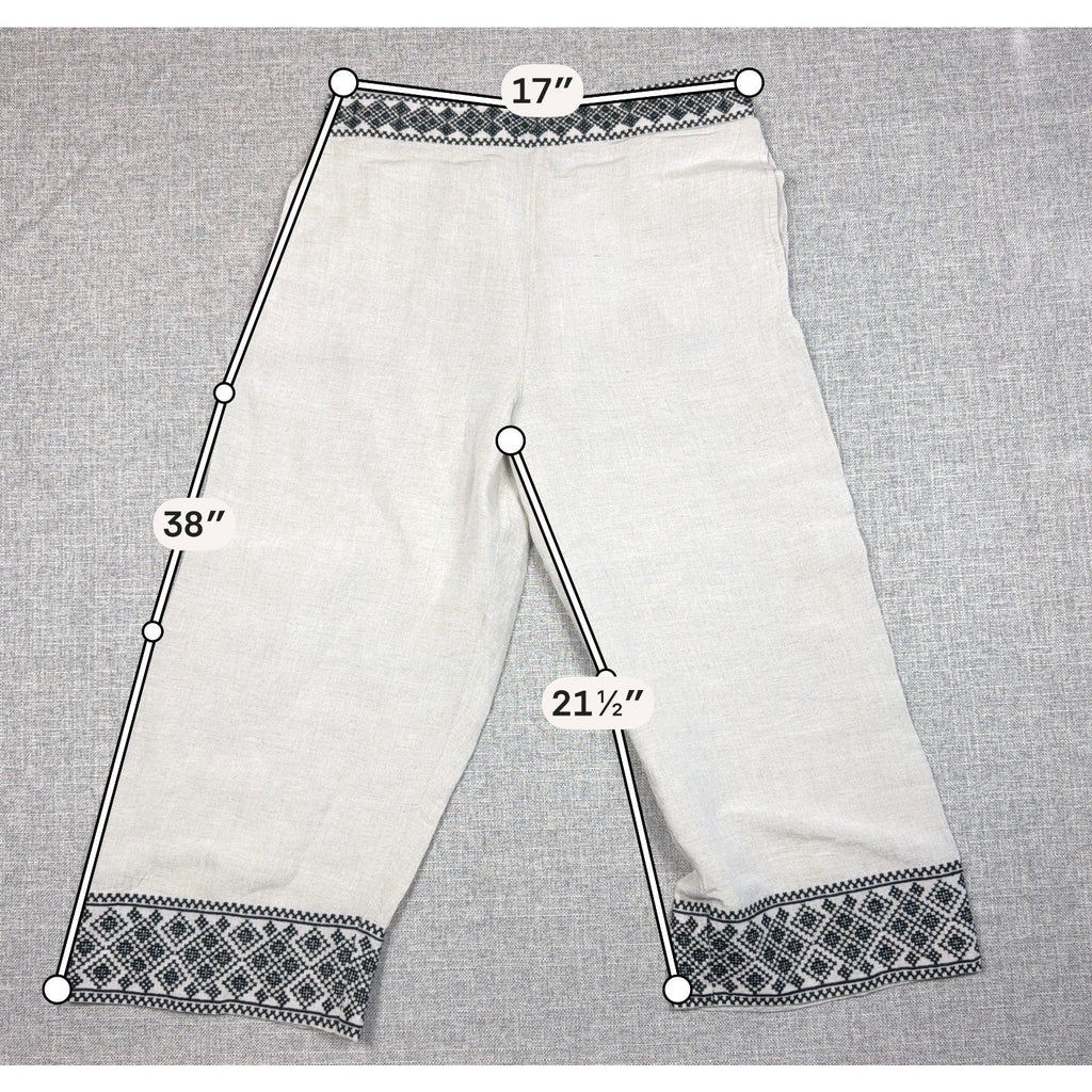 Second Half Supply Co, LLC cream wide-leg cropped pants with black geometric embroidery on waist and hem