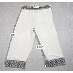 Second Half Supply Co, LLC cream wide-leg cropped pants with black geometric embroidery on waist and hem