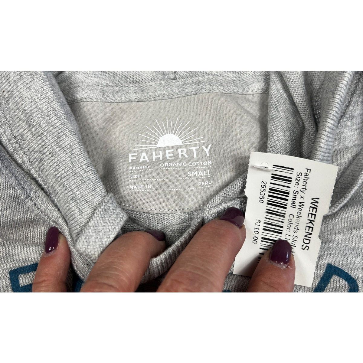 Second Half Supply Co, LLC Faherty organic cotton hoodie neck label with attached retail price tag