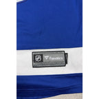 Second Half Supply Co, LLC Fanatics Tampa Bay Lightning jersey NHL tag detail on blue and white polyester fabric