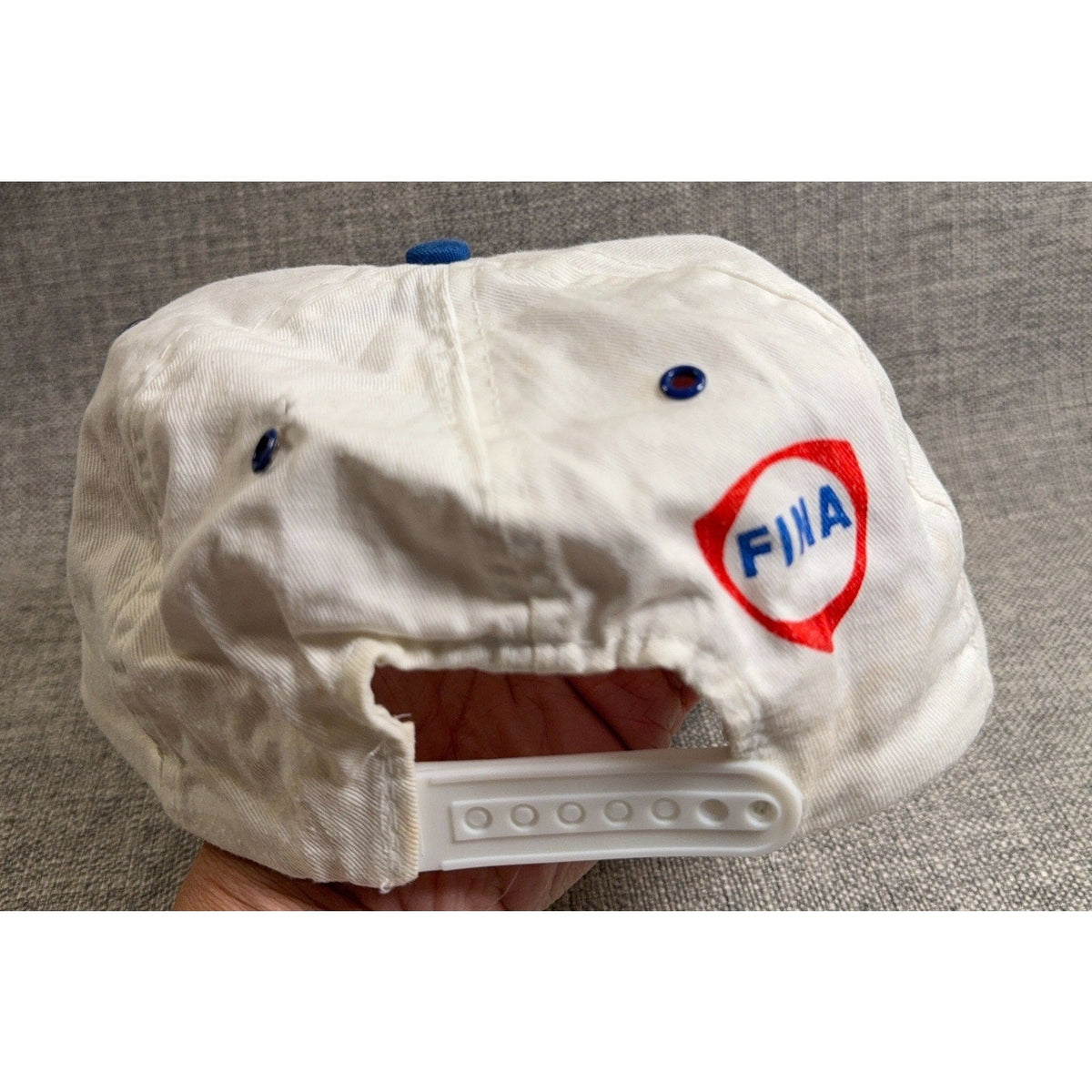 Second Half Supply Co, LLC vintage 1993 Texas Rangers FINA snapback hat with white crown and blue adjustable strap