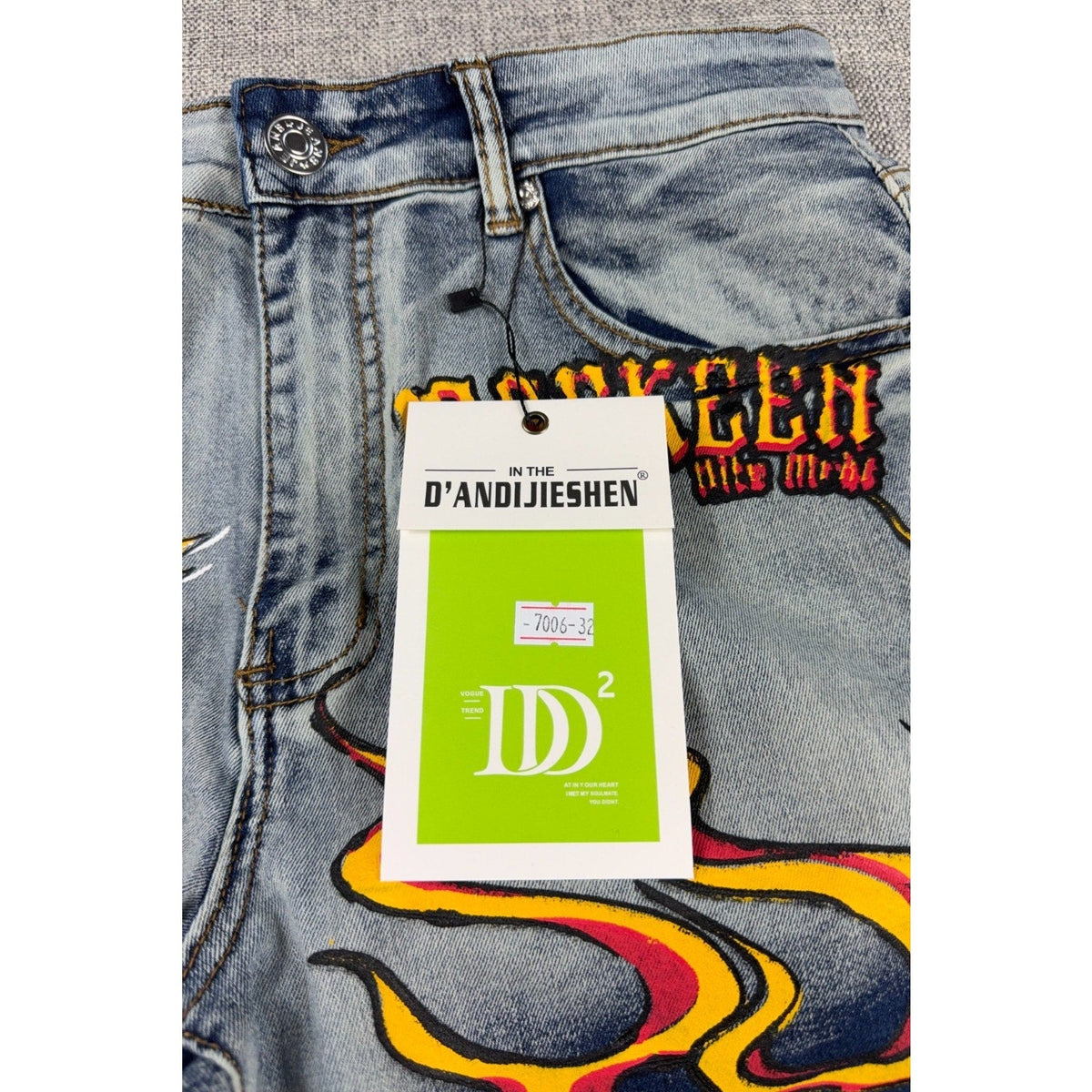 Second Half Supply Co, LLC D'Andijieshen light-wash denim shorts with yellow and red flame graphics and brand tag