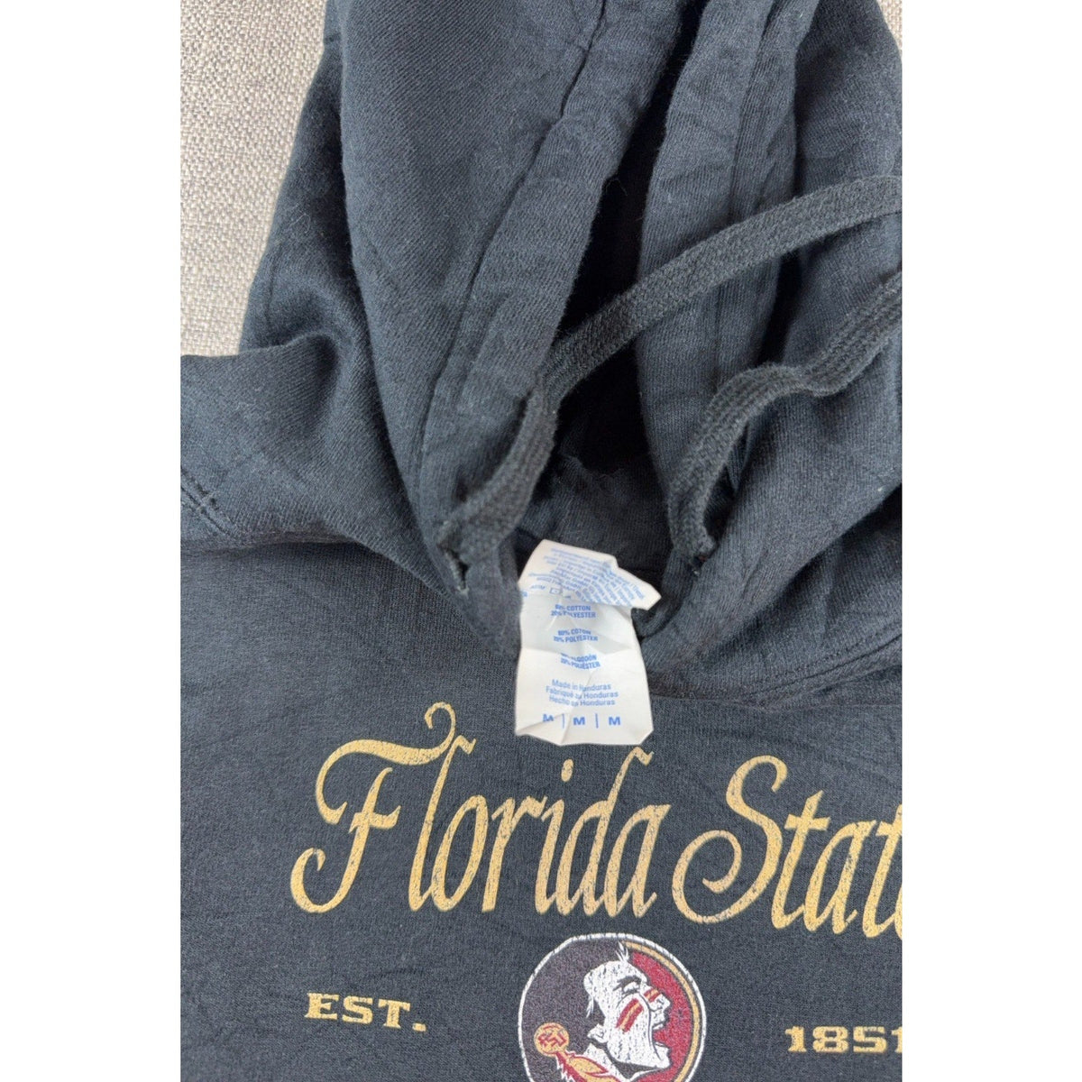Second Half Supply Co, LLC Florida State Seminoles faded black pullover hoodie with vintage graphic and drawstring hood