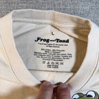 Second Half Supply Co, LLC cream cotton blend crew neck T-shirt with Frog and Toad Together interior neck label