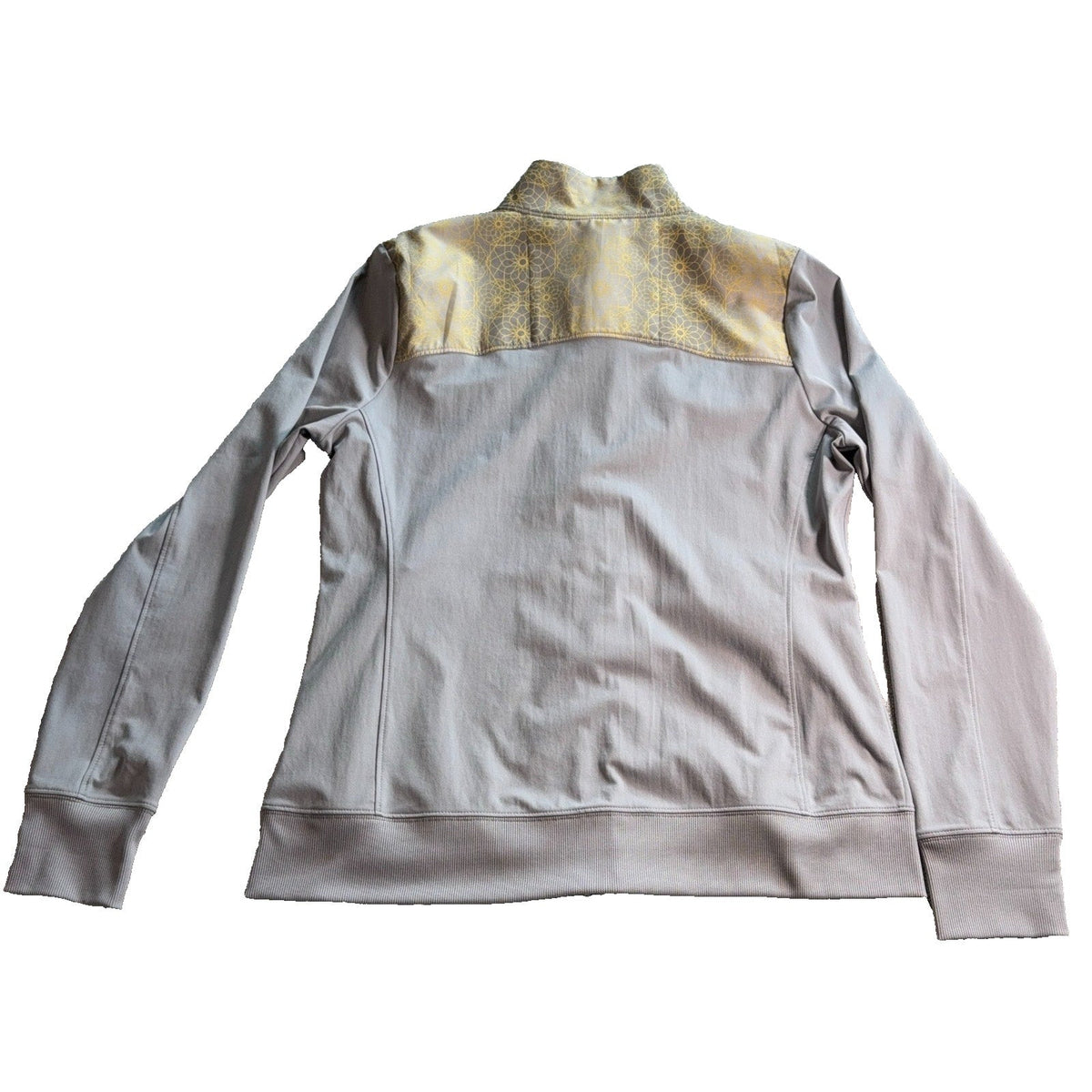 Second Half Supply Co, LLC Annika by Cutter & Buck gray golf jacket with yellow floral back yoke detail