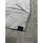 Second Half Supply Co, LLC gray organic cotton hoodie sleeve with ribbed cuff and small mountain sunrise logo patch