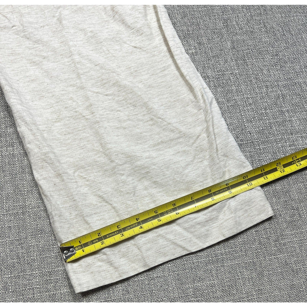 Second Half Supply Co, LLC gray linen blend wide leg pant hem measured with a yellow tape measure