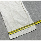 Second Half Supply Co, LLC gray linen blend wide leg pant hem measured with a yellow tape measure