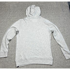 Back view of a light heather gray Faherty organic cotton hoodie with a hood and ribbed cuffs from Second Half Supply Co, LLC
