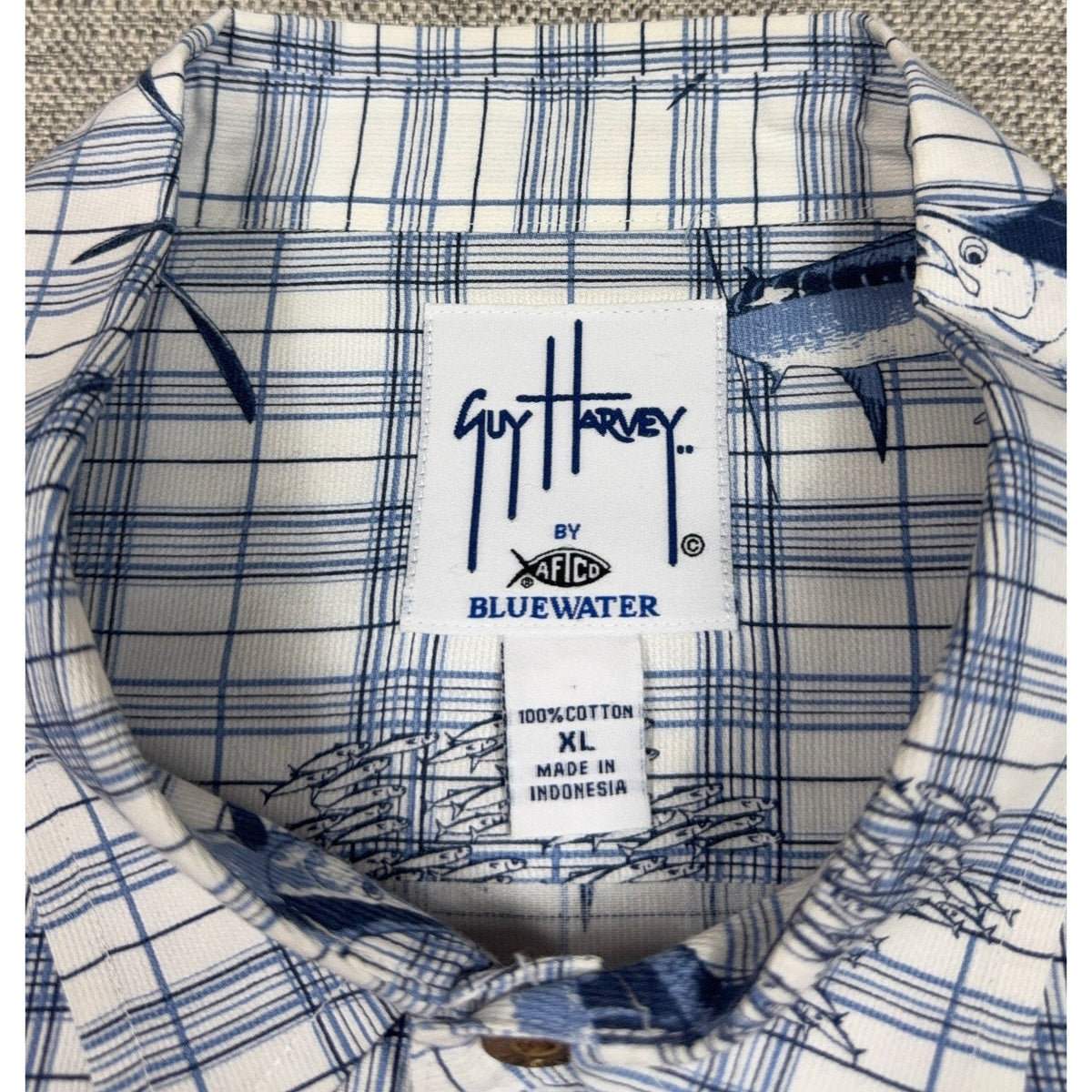 Second Half Supply Co, LLC Guy Harvey by AFTCO Bluewater shirt label showing size XL and 100% cotton material