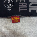 Second Half Supply Co, LLC Hard Rock Cafe black knit scarf with red logo tag and Love Serve All gray lettering