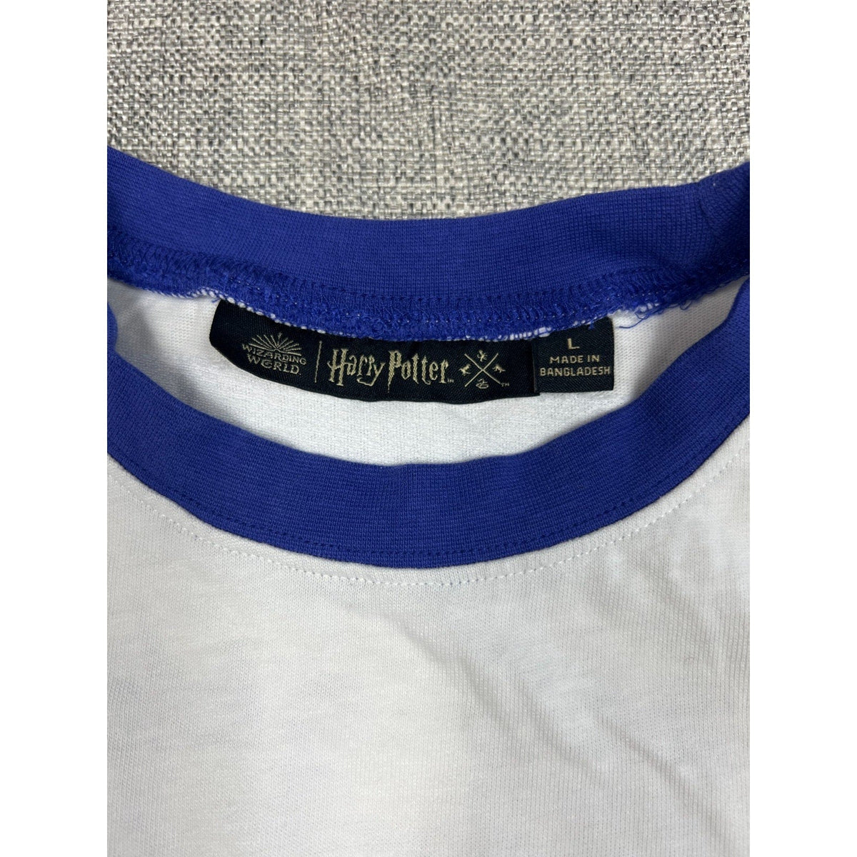 Second Half Supply Co, LLC Harry Potter Quidditch Supplies ringer t-shirt cream and blue neck label detail