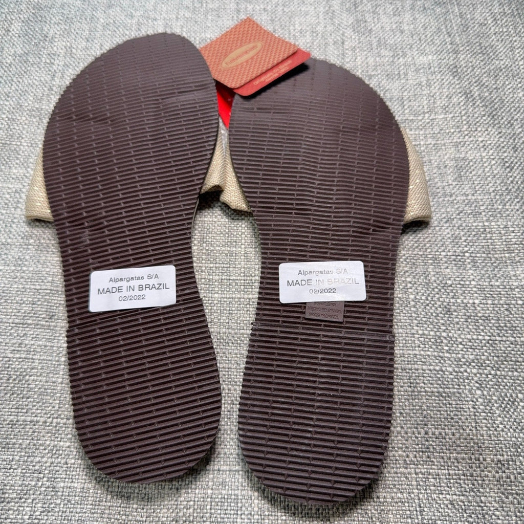 Second Half Supply Co, LLC Havaianas You St Tropez sandals showing the brown textured rubber outsoles and beige bows