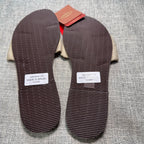 Second Half Supply Co, LLC Havaianas You St Tropez sandals showing the brown textured rubber outsoles and beige bows