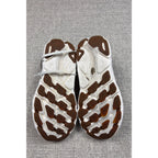 Second Half Supply Co, LLC HOKA Clifton 9 running shoes showing worn white midsoles and brown rubber traction outsoles