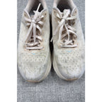 Second Half Supply Co, LLC HOKA Clifton 9 women's running shoes in shifting sand and eggnog with lace-up textile uppers.