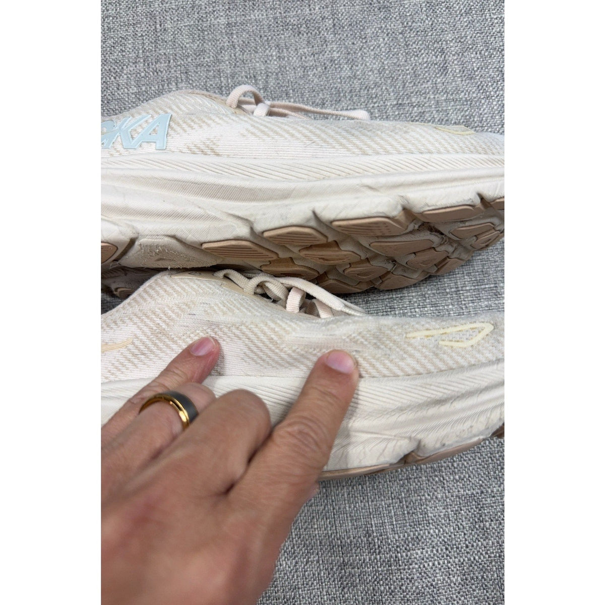 Second Half Supply Co, LLC HOKA Clifton 9 women's running shoes in shifting sand and eggnog with visible wear