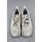 Second Half Supply Co, LLC HOKA Clifton 9 women's running shoes in shifting sand and eggnog with lace-up textile uppers.