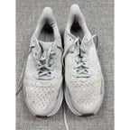 Second Half Supply Co, LLC pre-owned white HOKA Clifton 9 women's running shoes with knit uppers and cushioned midsoles.