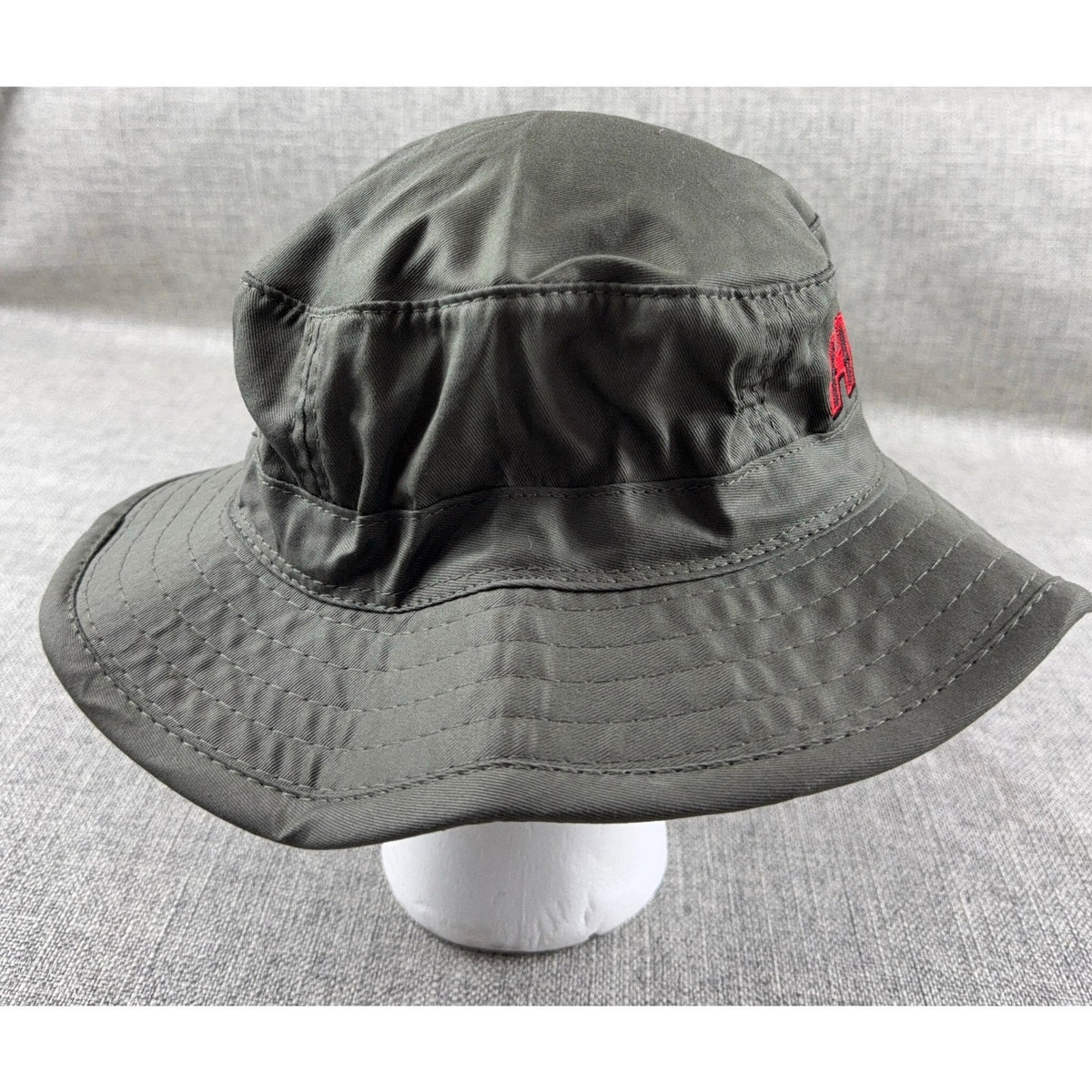 Second Half Supply Co, LLC dark olive gray Hornady boonie bucket hat with red embroidered logo and wide stitched brim
