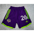 Second Half Supply Co, LLC Houston Dynamo Adidas soccer shorts in purple and neon green with number 26 and club crest