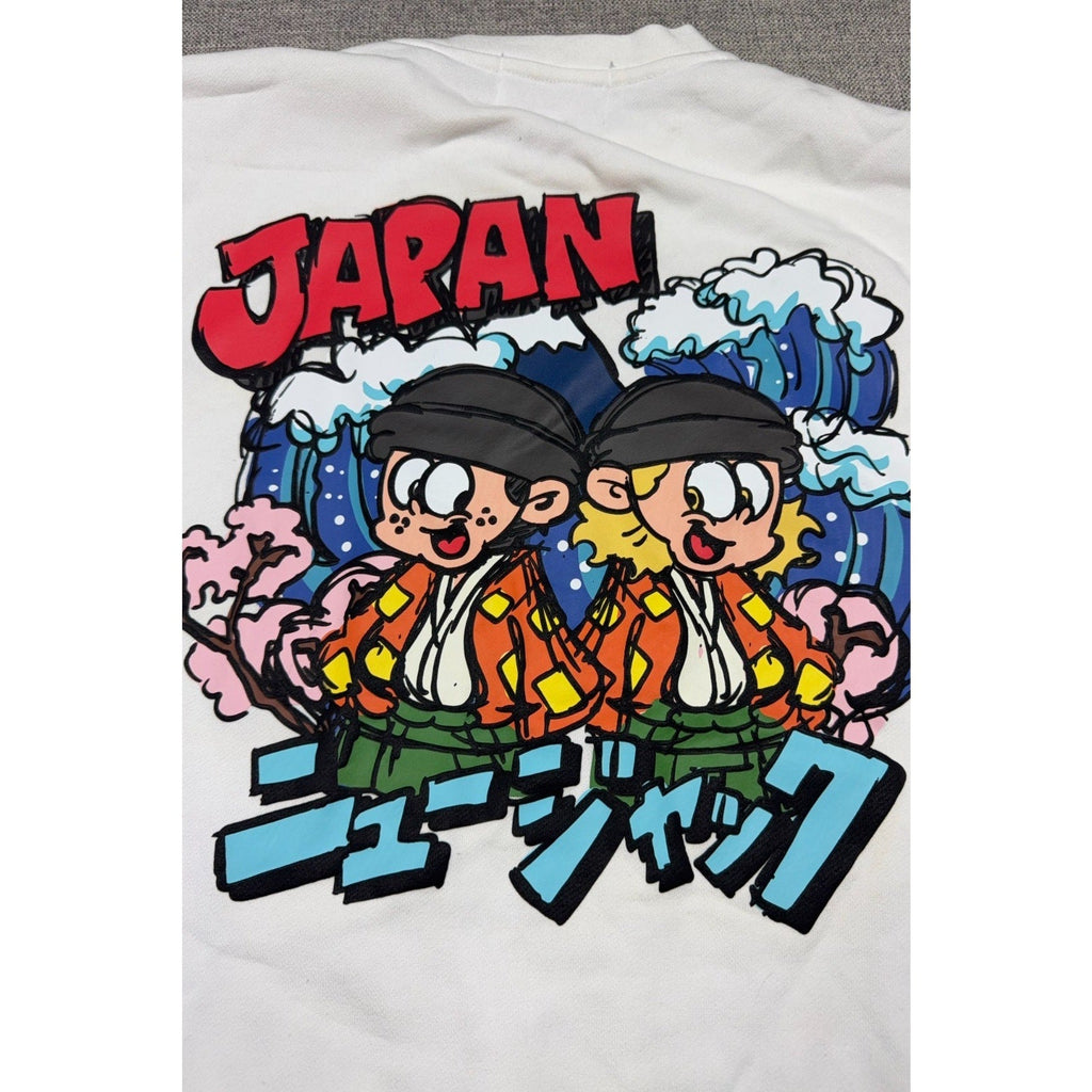 Second Half Supply Co, LLC white sweatshirt featuring a colorful Japanese cartoon graphic with waves and blossoms