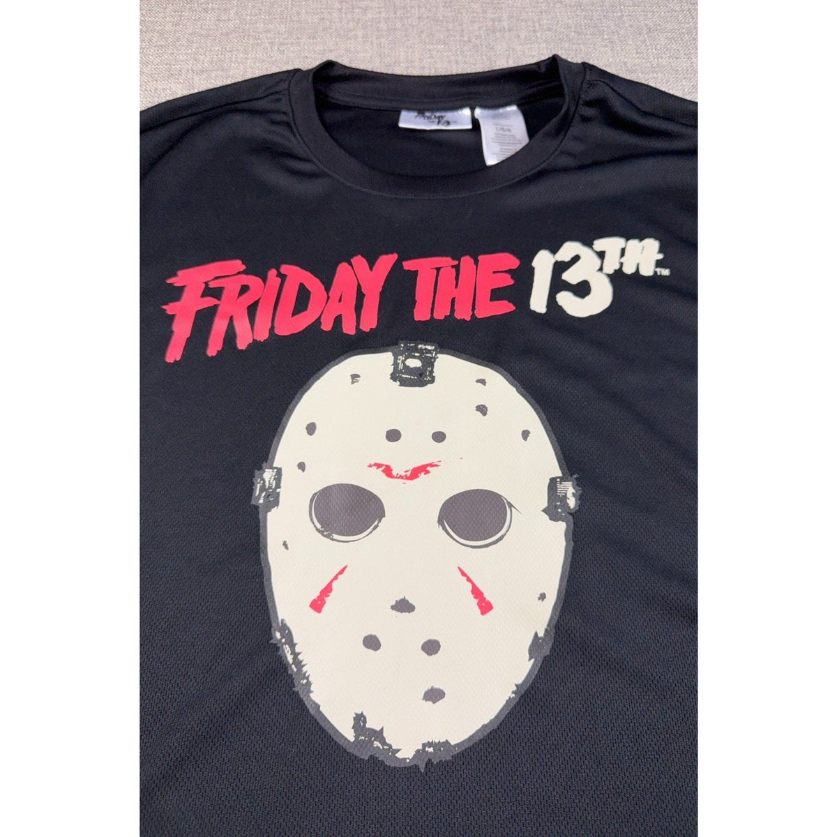 Second Half Supply Co, LLC black polyester Friday the 13th hockey jersey featuring a large Jason Voorhees mask graphic