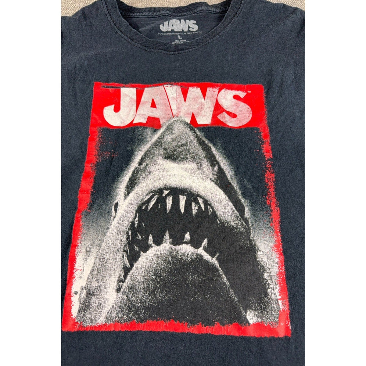 Second Half Supply Co, LLC black cotton Jaws movie T-shirt with iconic great white shark graphic print
