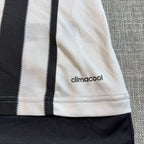Second Half Supply Co, LLC Adidas Juventus 2015-16 home jersey featuring black and white stripes and Climacool fabric.