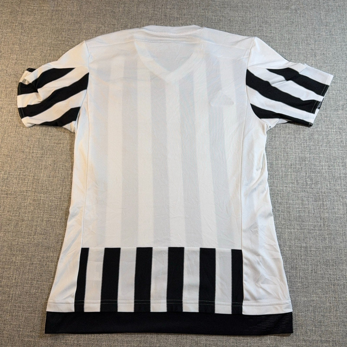 Second Half Supply Co, LLC Adidas Juventus 2015-16 home soccer jersey back view with black and white vertical stripes