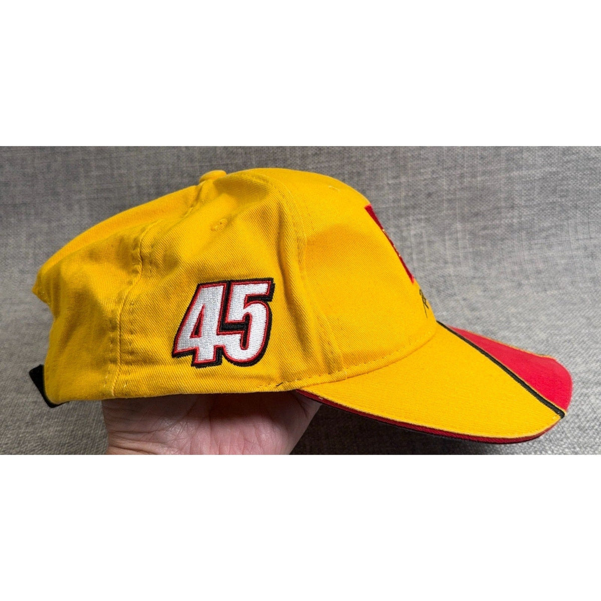 Second Half Supply Co, LLC vintage yellow NASCAR hat featuring embroidered number 45 and red wave-style side panels