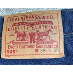 Second Half Supply Co, LLC vintage Levi's 505 jeans leather waistband patch showing size 38x30 on dark indigo denim