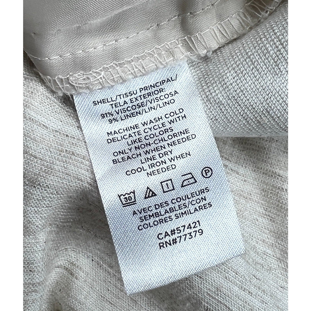 Second Half Supply Co, LLC care tag for Ann Taylor Factory pants showing 91% viscose and 9% linen fabric composition