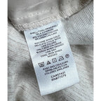 Second Half Supply Co, LLC care tag for Ann Taylor Factory pants showing 91% viscose and 9% linen fabric composition