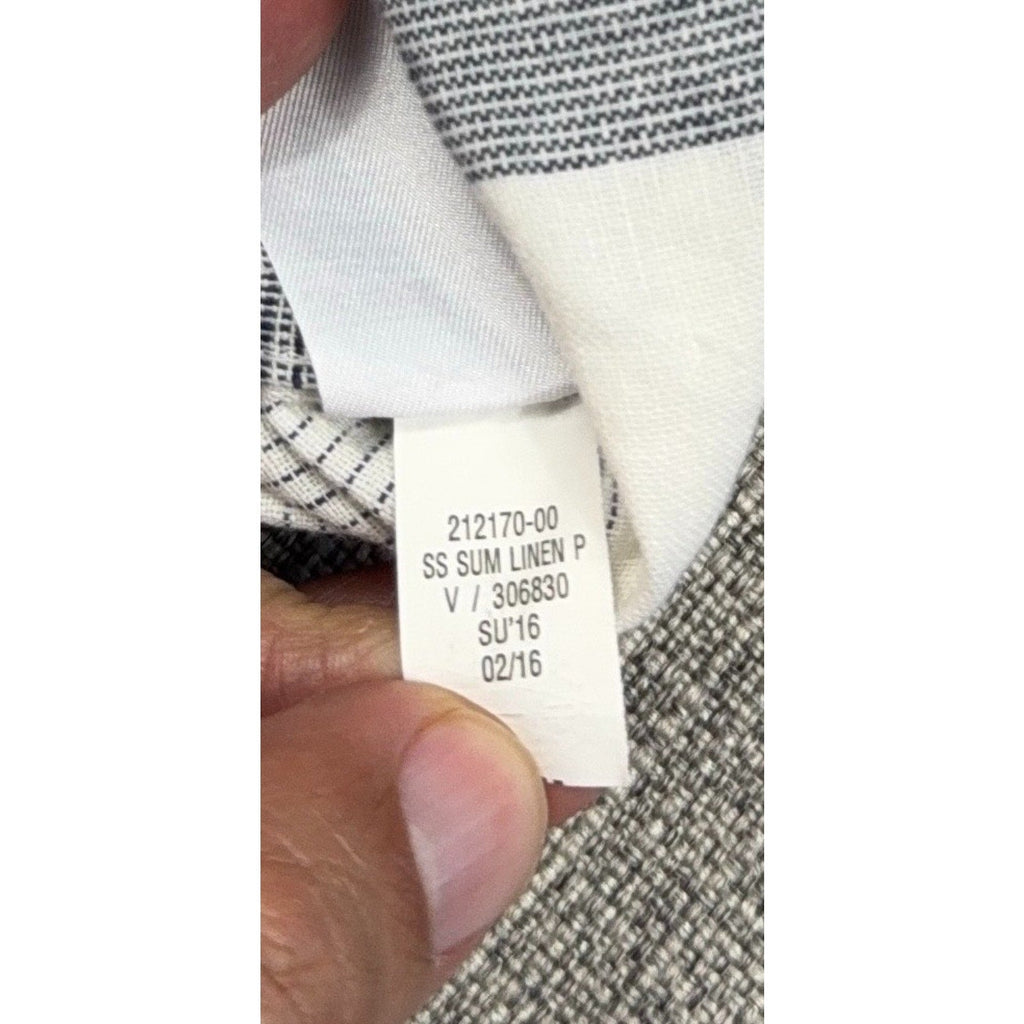 Second Half Supply Co, LLC tag detail of a Banana Republic linen shirt showing product code and summer 2016 date