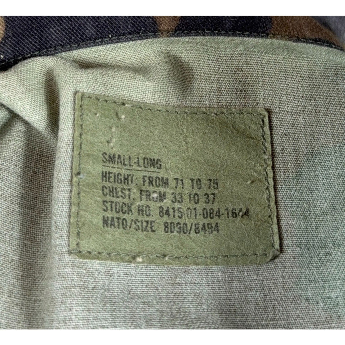Second Half Supply Co, LLC vintage USGI M81 woodland camo BDU coat size label showing small-long specifications