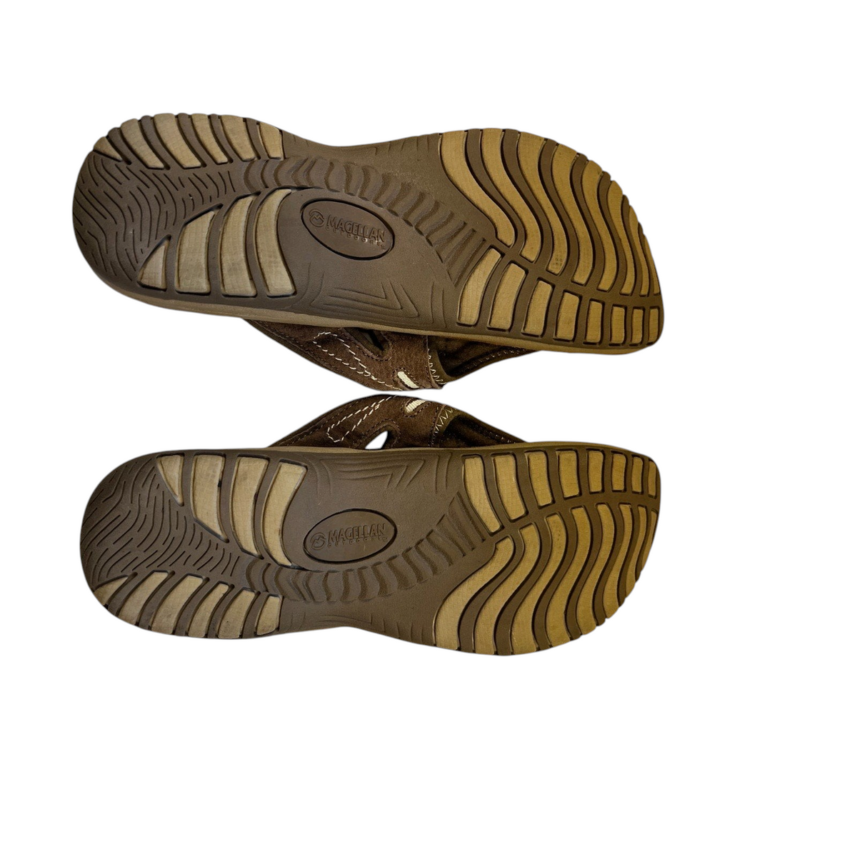 Second Half Supply Co, LLC Magellan Outdoors brown thong sandals showing durable traction outsoles and tread pattern