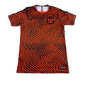 Second Half Supply Co, LLC Manchester City Nike Dri-FIT soccer shirt in red and black with geometric pattern