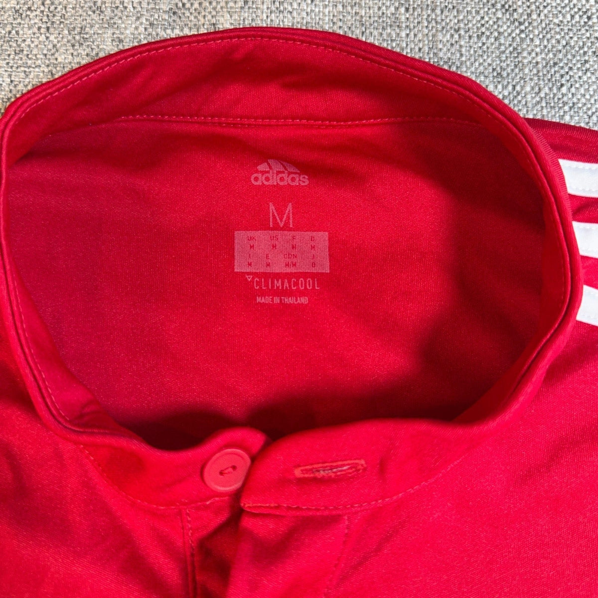 Second Half Supply Co, LLC Adidas Manchester United 2017-18 home jersey collar detail with Climacool branding
