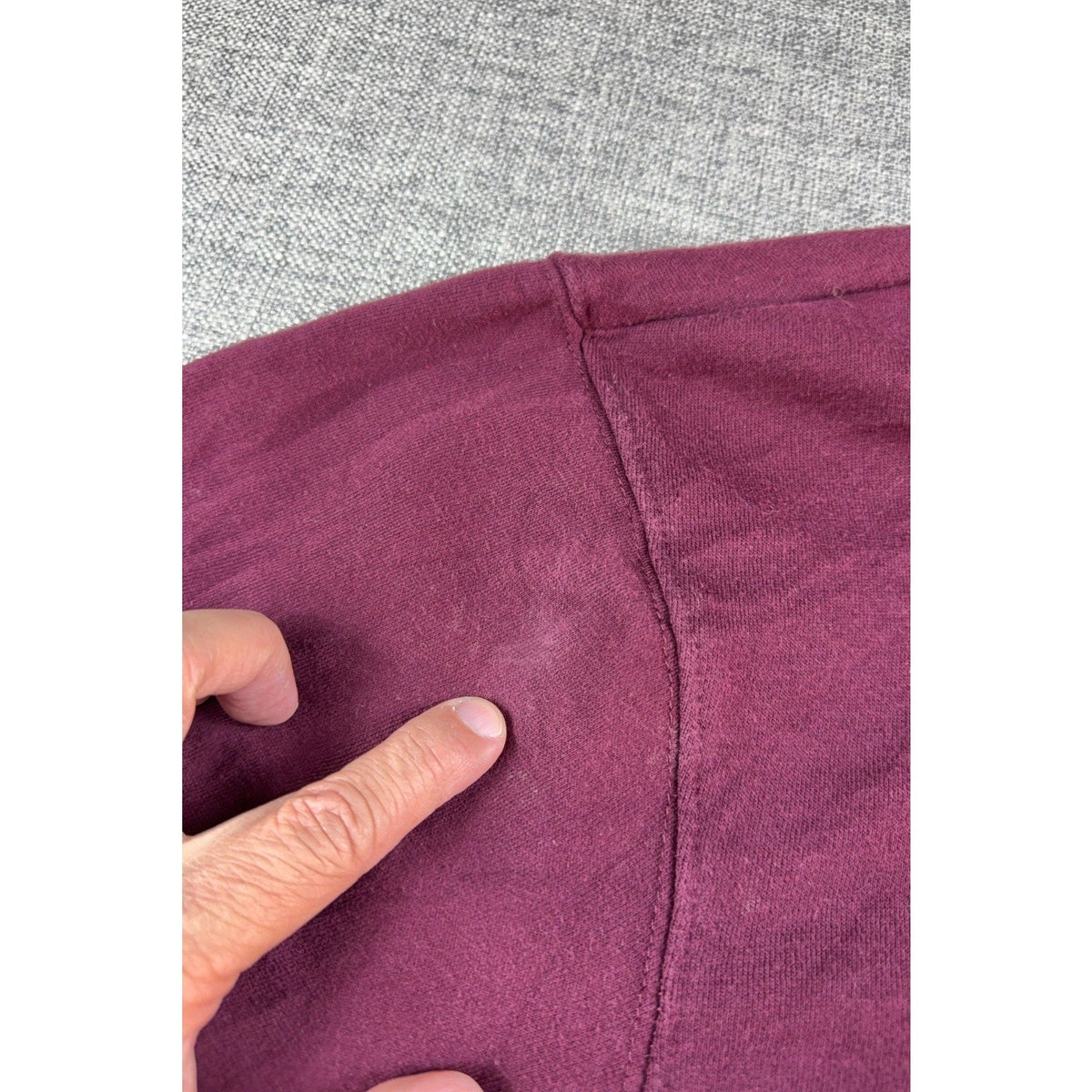 Second Half Supply Co, LLC maroon Texas A&M sweatshirt showing a small fabric mark on the shoulder area