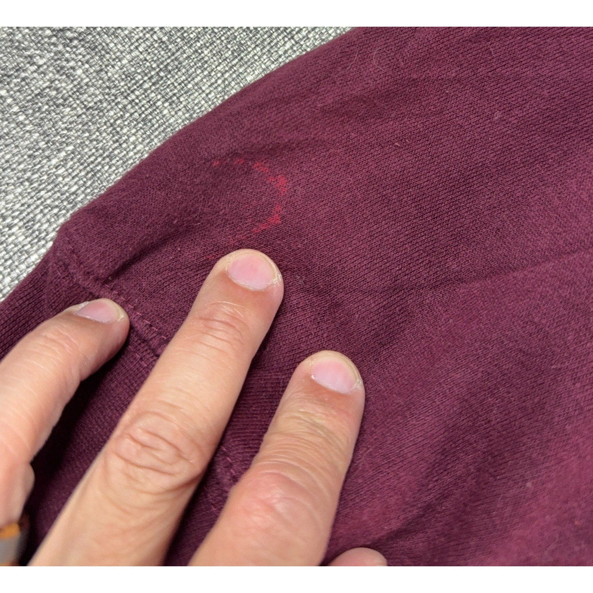 Second Half Supply Co, LLC maroon Texas A&M Aggies sweatshirt showing a small stain on the fabric