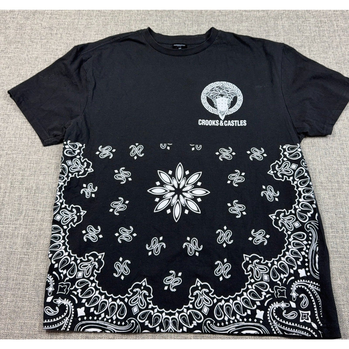 Second Half Supply Co, LLC black cotton graphic t-shirt with white Medusa logo and paisley bandana print design.