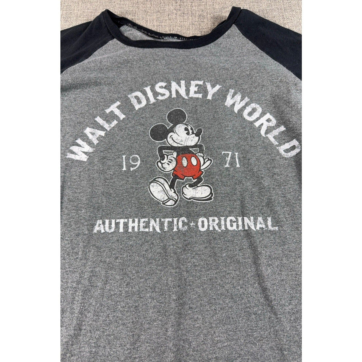 Second Half Supply Co, LLC vintage-style heather gray and black raglan shirt with distressed Mickey Mouse 1971 graphic